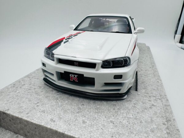 MOTORHELIX 1:18 NISSAN GTR R34 NISMO WHITE PEARL - Imagen 5